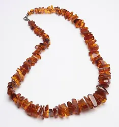 Beautiful chunky amber necklace with graduated multiple chunks of cognac and honey amber. This is a long beautiful...