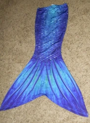 No monofin included with this tail. Comfortable premium swimsuit fabric with 4-way stretch (80% Polyester, 20% Spandex).