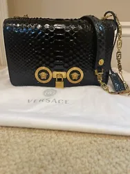 Versace Snakeskin Handbag. Mint condition!Rare and one of a kind handbag!100% AuthenticPurchased from a Versace...