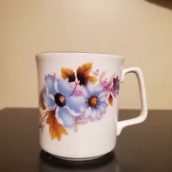 Vintage Royal Grafton Bone China Floral Coffee Cup Blue Flowers. Mint condition no chips or cracks, no faded gold.
