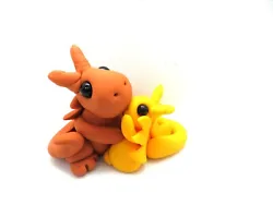 This mommy dragon is loving her baby. They are made for mature children to adults. They are semi fragile and are to be...
