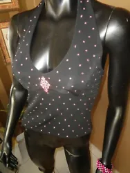 Black, low V neckline and pink dotted rhinestones, with pink bosom center rhinestone trim broach. Padded inner bra...
