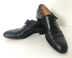 For sale is an authentic pair of Goodyear welted Gucci leather dress shoes in classic black leather.