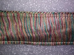 6 yards Brush Fringe in the colors TEAL/MAUVE/RED/BEIGE. Brush fringe length is 2