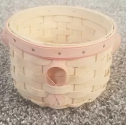 It is handmade and in original condition, with no signs of wear and tear. This beautiful pink basket, made by...