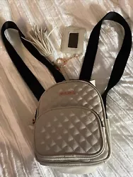 Steve Madden mini backpack purse cream and rose gold with black straps. See pictures