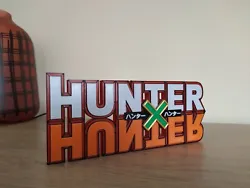 Voici un logo du manga hunterxhunter, parfait pour décorer votre collection de mangas. parfait pour les fans!