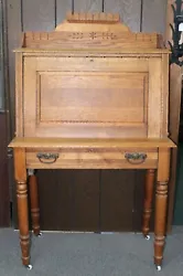 Presented for your consideration is this nice antique drop front secretary desk. The desk is made of oak and features...