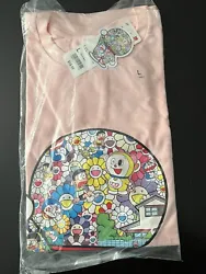 This Uniqlo x Doraemon x Takashi Murakami collaboration T-shirt is a must-have for any fan of the iconic characters....