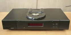 Rega Jupiter CD player in perfect working order. Includes orig. box, manual, remote, power cord. Color: black.