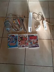 Console Nintendo Wii + Accessoires + Jeux.  Console en bon état vendue avec ses câbles péritel , électrique, une...