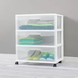 The drawer design features an integrated handle for easy opening and is clear, allowing contents to be easily...