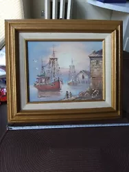 Vintahe signed J.MARTIN FISHING SAIL BOATS AT DOCK OIL CANVAS PAINTING framed. From estate couple nicks in frame is...