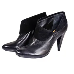 Coach Annika booties. soft black leather outer with black suede accent lining around ankle. leather insole.