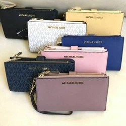 JET SET TRAVEL DOUBLE ZIP WALLET WRISTLET. MK signature logo lettering. Detachable 7
