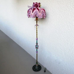 The cast iron base of this floor lamp is very ornate with a great details. The power cord is new and the switch as...