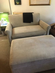 This Crate and Barrel loveseat, accompanied by an ottoman with storage, is perfect for small spaces. It comfortably...