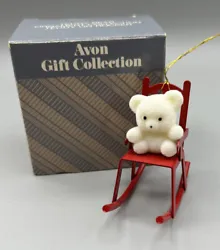 Avon Christmas tree ornament, Teddy in a rocking chair.  The ornament is made of metal. the Teddy Bear is furry but...
