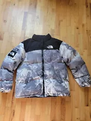 This rare and collectible North Face x Supreme Nuptse jacket is a must-have for any fashion enthusiast. With its unique...
