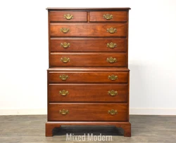 A solid cherry traditional tall dresser with dovetailed drawers and brass hardware by Henkel Harris Virginia Galleries.