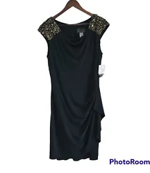 Alex Evening stunning black dress. Has a faux wrap look that gently swoop look to the side.