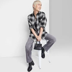 •Oversized button-down flannel shirt •Made from soft cotton blend •Collared neck •2 front pockets...