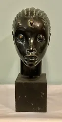 This wonderful sculpture is mounted on a wood base. The sculpture is signed on the back of the neck and is in excellent...