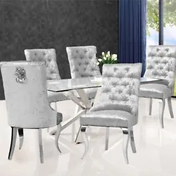Dine-in luxurious style with this Upholstered Dining Chair. Featuring a curved Tufted high back, plush cushioned seat...
