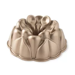 Shapely leaves surround an open blossom in this new botanical beauty! Add glaze or dust with confectioners sugar for a...