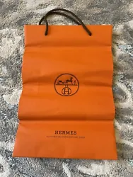 Hermes Orange Shopping Gift Paper Bag Approx 16 X 11 X 4. Used. Bag has signs of wear in creasing. Bag comes as it...