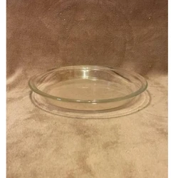 Minor surface wear & small scratches on bottom of plate from use.