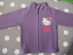 Pull Hello Kitty violet de Carrefour 2-3 ans. État : Occasion Service de livraison : Livraison en Relais Mondial...