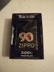up for bid is a 49864 Zippo 90th anniversary brand new never used with inner and outer boxes