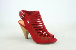 Open toe, strappy construction at vamp, stitching details. Low platform, and chunky heel. ~heel height: 4.25.