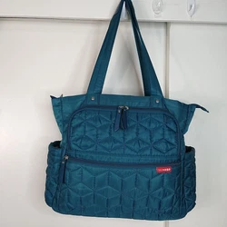 Skip Hop Forma Pack & Go Diaper Tote Bag Peacock Turquoise.  Good preowned condition does have a few spots.  Includes...