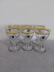 Petites usures de la couleur jaune et de la bande noire.Très bon état. Haut:11cms.
