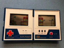 Game and Watch RAIN SHOWER non teste pour piece. Pour plus de renseignements contactez-moi merci
