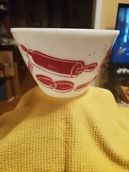This is a beautiful piece of Fire King. Its a 3qt. Mixing bowl with great graphics in red. There is very little fading...
