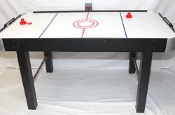Air Hockey table includes 2 puck pushers and 2 pucks.