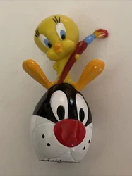 Vintage Tweety Bird Artist Atop Sylvester Easter Egg PVC Figure 1999 Warner Bros.  This is in good used condition with...