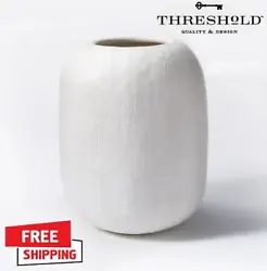 Add a touch of eye-catching style to your indoor space with this Textured Stoneware Vase from Threshold and designed...