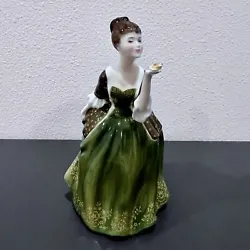 This vintage Royal Doulton porcelain figurine, titled 
