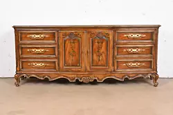A gorgeous French Provincial Louis XV style long dresser or credenza. Carved walnut with shell motif, hand-painted...