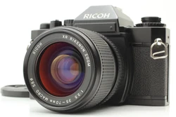 All shutter speeds work from low speed to high speed. tiny scuffs from normal use. There is no fog. Above condition is...