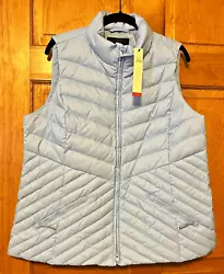 Talbots The Puffer Vest. Woman Size X. Shell: 100% Nylon. Filling: Down (minimum 90%). Light Blue. Two front pockets...