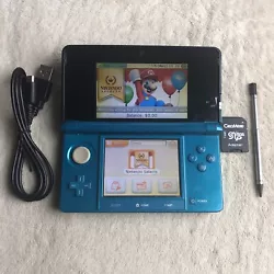 Including -used 3ds console- Charging Cable- Stylus- 32GB SD cardsThe shell shows some light scratches and marks. (As...