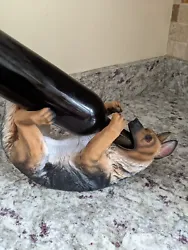 Wine bottle holder German Shepherd. This wine bottle holder is new with tags , no original box, it was in our winery on...