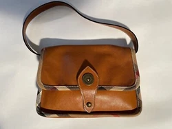 Its clear its a Burberry, but its not gaudy with Burberry design - a classy-looking bag.
