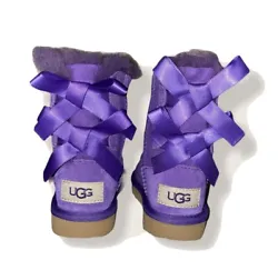 Purple Toddler/littles Ugg Boots. Warm fur on the inside, cute double bows in the back.