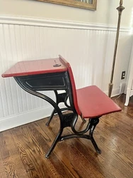 This is an antique school desk circa 1900. It was made by American Seating Inc. which is a company specializing in the...